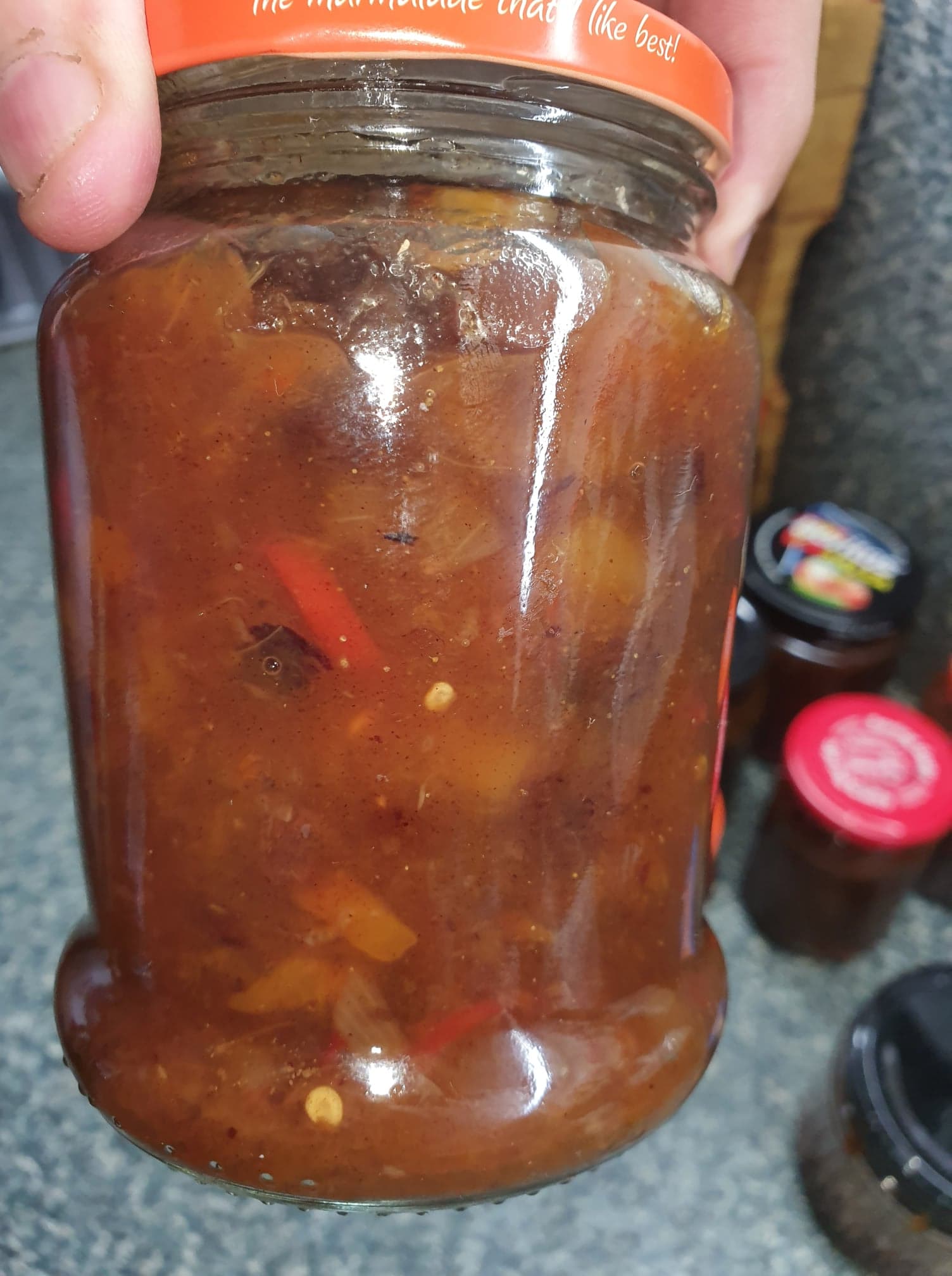 An image of jarred spicy mango chutney.